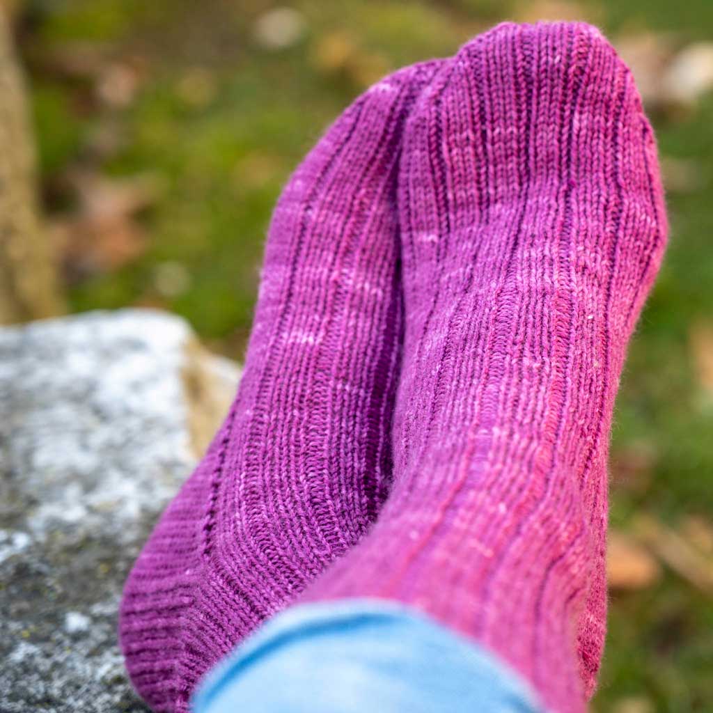 pink hand knit socks using naturally dyed organic wool